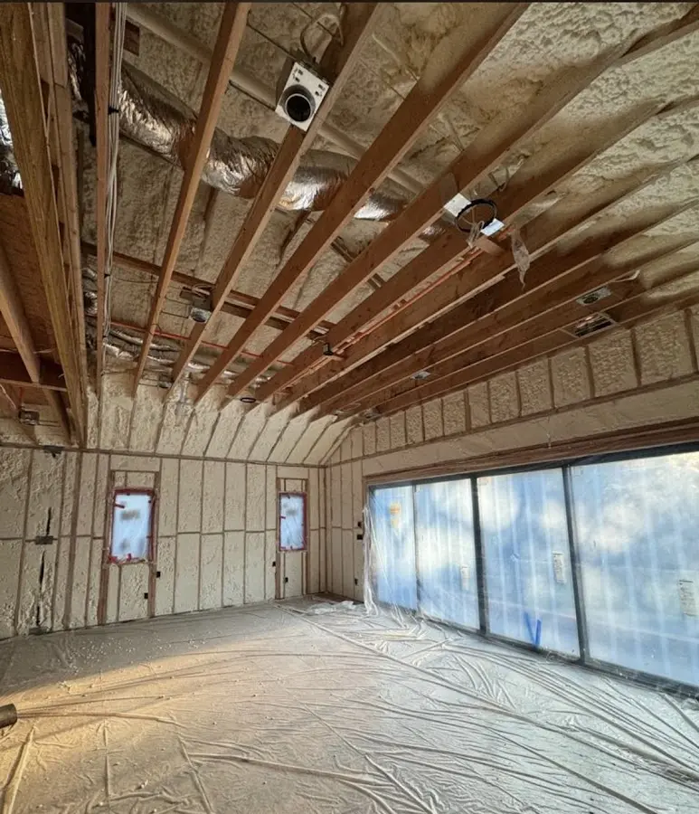 Interior walls and ceiling insulated with spray foam during new construction in Waimanalo